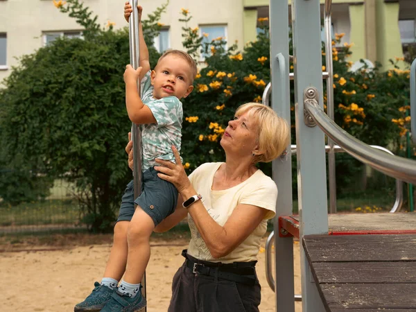 Grandmother Supporting Holding Her Years Old Grandson Children Playground Grandmother — Photo