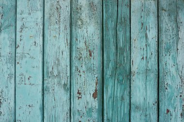 Wood background texture. Wooden surface, old boards, blue-green paint, blank retro template for advertising lettering, rough material, grungy textured background closeup