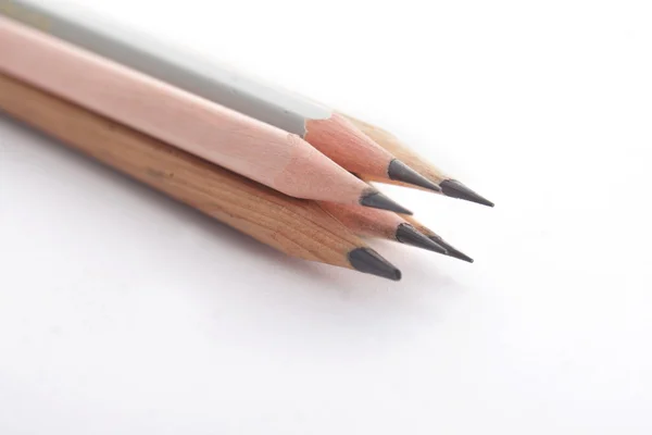 Lápis sobre fundo branco — Fotografia de Stock