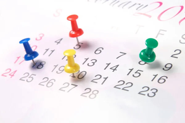 Closeup calendar & push pins — Stock Photo, Image