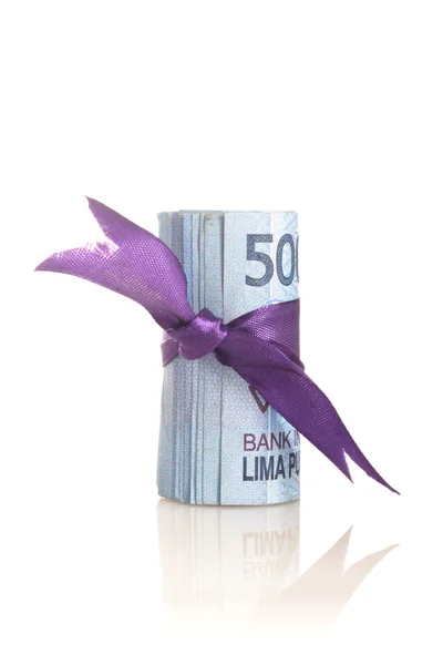 Rupiah - argent indonésien avec du ruban adhésif violet — Photo
