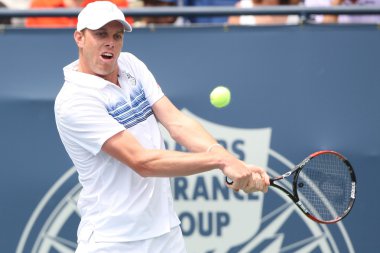 Andy Murray of Great Britain and Sam Querrey of USA (pictured) play the final match at the 2010 Farmers Classic clipart
