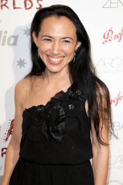 American actress Irene Bedard arrives at the Nomad Two Worlds Los Angeles gala at 59 Pier Studios West clipart