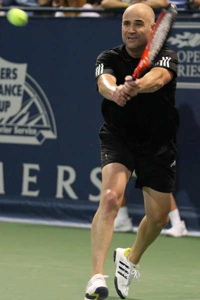 Andre agassi ve john mcenroe sadaka maç oynamak