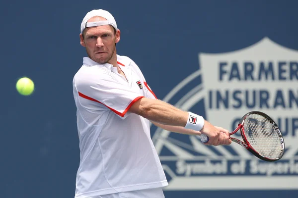 Horacio zeballos und rainier schuettler spielen ein match — Stockfoto