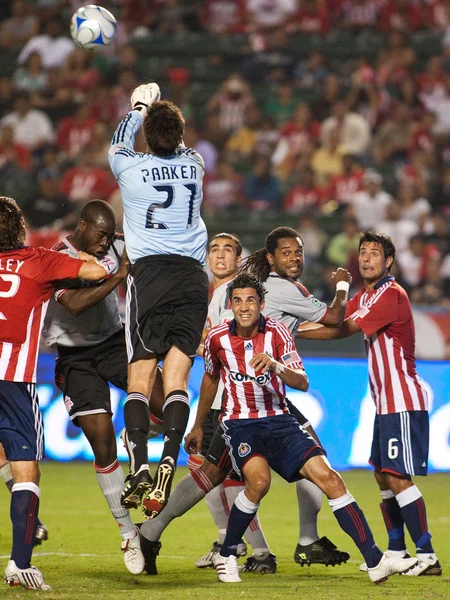 Goal keeper Lance Parker punching the ball out of the box during the match — Stock Photo, Image