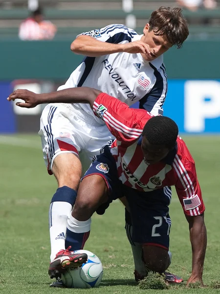 Michael Lahoud et Wells Thompson pendant le match — Photo