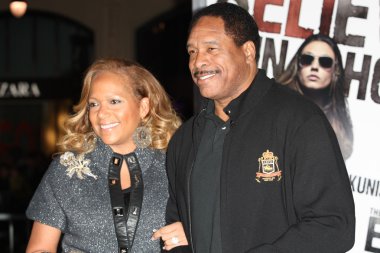 Dave Winfield and wife Tonya Winfield attend The Book of Eli premiere clipart