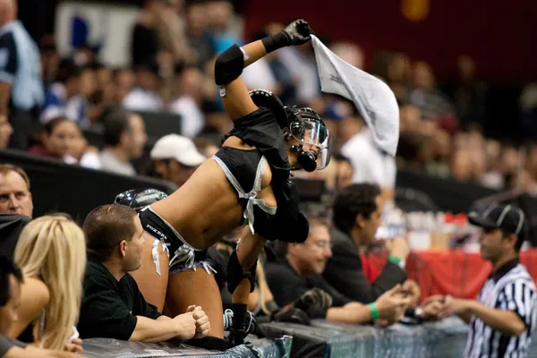 A Temptation player waving a rally towel during the match — Stock Photo, Image