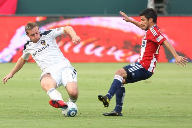 Chris birchall ve paulo nagamura oyun sırasında eylem