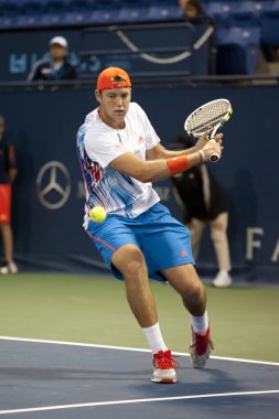 Jack çorap flavio cipolla dönüş tenis maçı sırasında backhands.