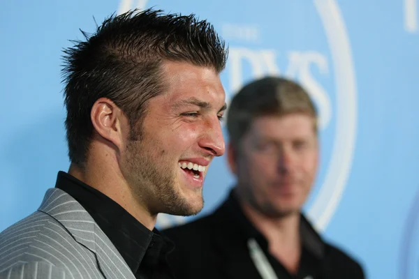 Denver Broncos Quarterback Tim Tebow assiste à Fat Tuesday — Photo