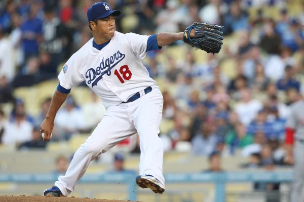 Hiroki Kudora pitches during the game — Stock Photo, Image