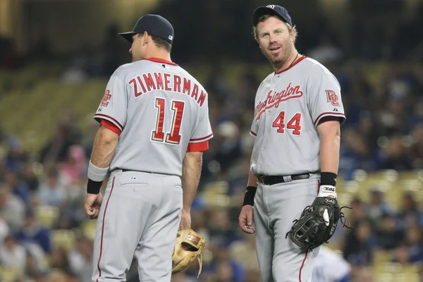 Ryan Zimmerman and Adam Dunn have a quick chat during a break in play of the game — Stock Photo, Image