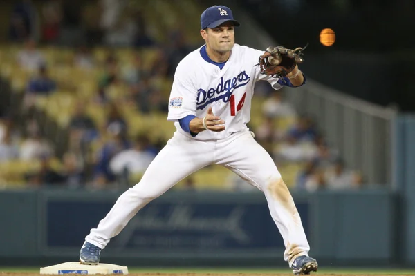 JAMEY CARROLL completes the play for an out at second during the game — Stock Photo, Image