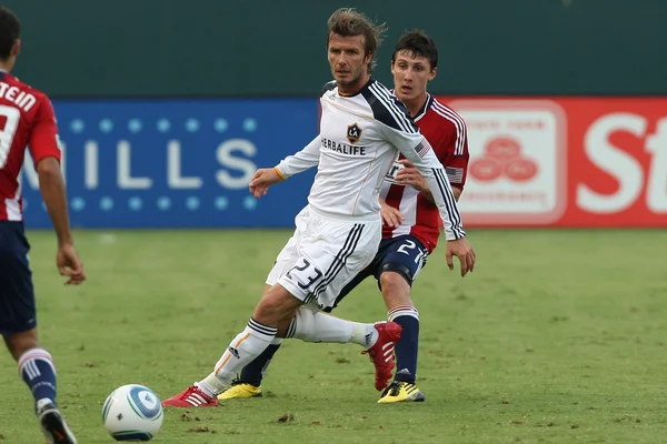 David Beckham and Ben Zemanski in action during the game — Stock Photo, Image