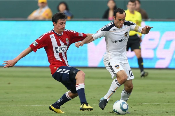 Ben Zemanski and Landon Donovan in action during the — Stock Photo, Image