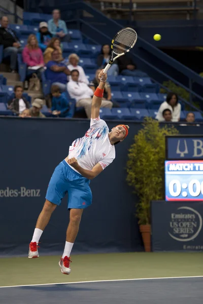 Jack Sock practices his serve against Flavio Cipolla during the tennis match — Stock Photo, Image