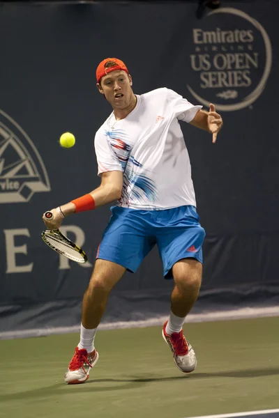 Jack Sock forehands his return to Flavio Cipolla during the game — Stock Photo, Image