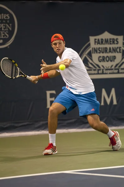 Jack Sock forehands his return to Flavio Cipolla during the game — Stock Photo, Image