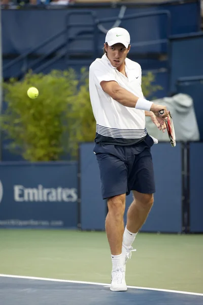 Igor sijsling geri oyun sırasında backhands. — Stok fotoğraf