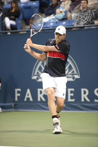 Sam Querrey backhands his return during the game — Stock Photo, Image