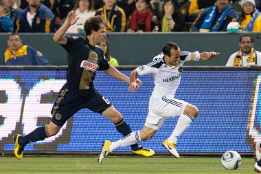 Landon donovan ve stefani miglioranzi oyun sırasında eylem