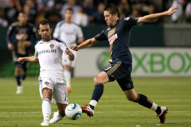 Juninho ve kyle nakazawa dövüş oyun sırasında top için