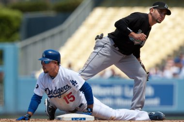 Rafael Furcal successfully slides into second past Florida Marlins second baseman Omar Infante during the game clipart