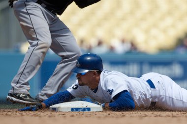 Rafael Furcal slides head first in to second during the game clipart
