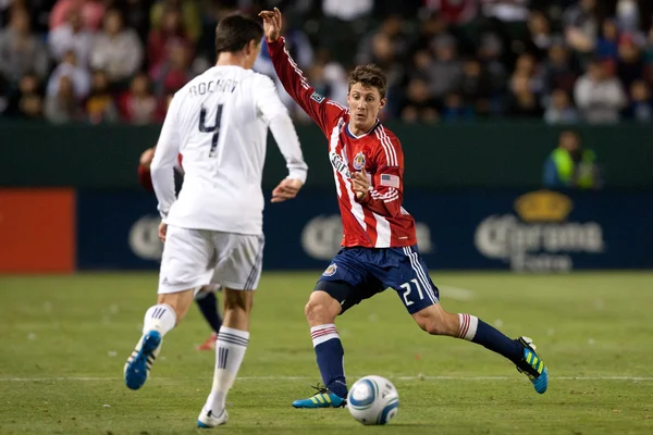 Ben Zemanski tries to get past Alain Rochat during the game — Stock Photo, Image