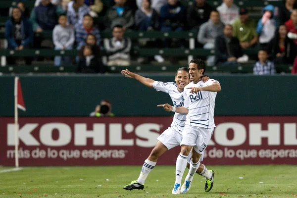 Camilo and Alexandre Morfaw celebrate a quick equalizer during the game — 图库照片