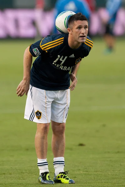 Robbie Keane se calienta antes del juego —  Fotos de Stock