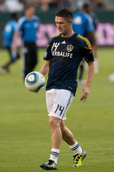 Robbie Keane se réchauffe avant le match — Photo