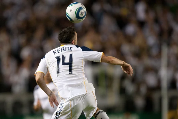 Robbie keane in actie tijdens het spel — Stockfoto