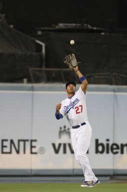 MATT KEMP catches a fly ball during the game clipart