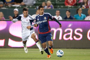 Benny feilhaber ve mariano trujillo oyun sırasında top için mücadele