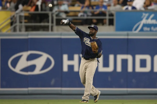 TONY GWYNN takes off to first after getting a piece of the ball during the game — Stock Photo, Image