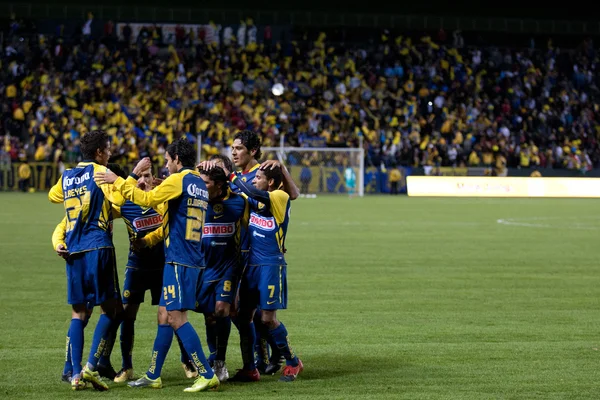 Club America celebrate a goal by midfielder Angel Reyna during the game — Stock Photo, Image