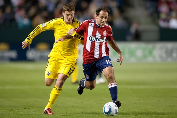 Nick La Brocca and Robbie Rogers fight for the ball during the Major League Soccer game — Stock Photo, Image