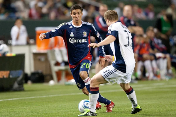 Zarek Valentin and Zak Boggs in action during the game — Stock Photo, Image