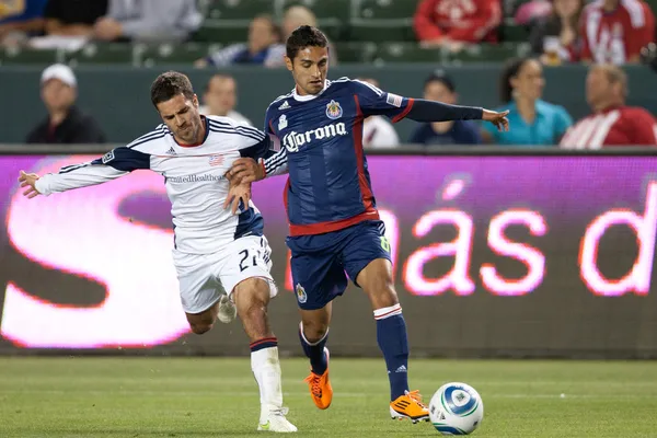 Benny Feilhaber and Mariano Trujillo fight for the ball during the game — Stock Photo, Image