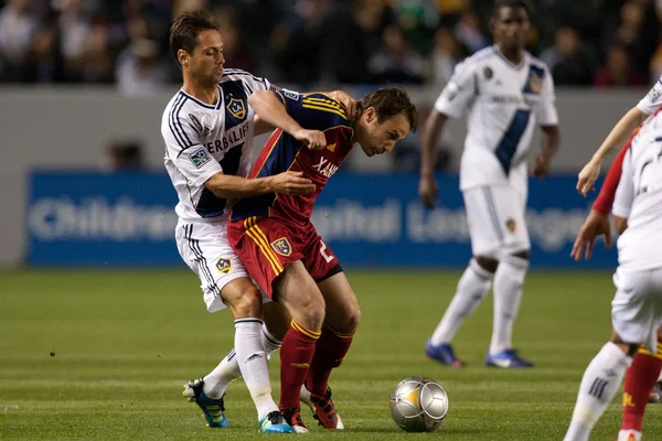 Marcelo Sarvas and Ned Grabavoy in action during the game