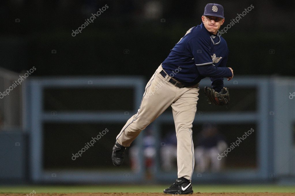 DAVID ECKSTEIN throws to first during the game – Stock Editorial