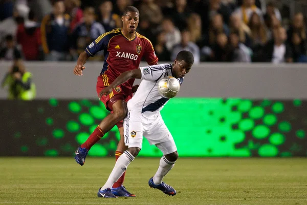 Edson Buddle and Chris Schuler in action during the Major League Soccer game — Stock Photo, Image