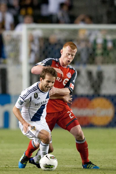 Richard Eckersley and Mike Magee in action during the game — Stock Photo, Image
