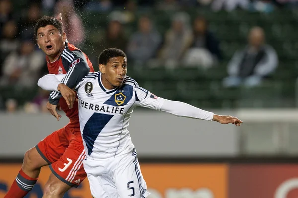 Sean Franklin and Miguel Aceval in action during the game — Stock Photo, Image