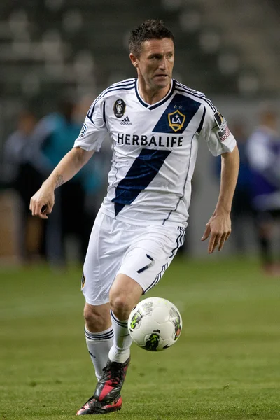 Robbie Keane controls the ball during the game — Stock Photo, Image
