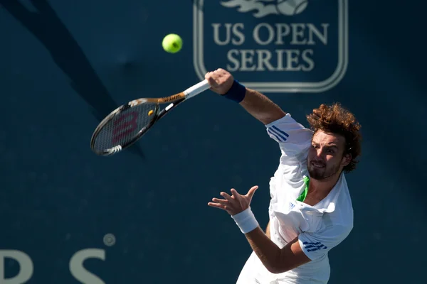 Ernests Gulbis en acción durante el juego —  Fotos de Stock