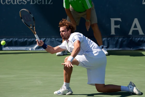 Ernests Gulbis en acción durante el juego — Foto de Stock